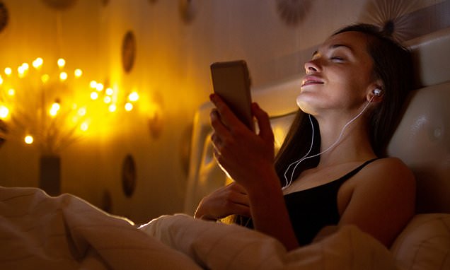 Listening to earworm songs before bed is disruptive to sleep, study finds – Daily Mail